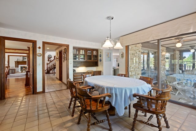 10 Shoreside Dr, South Barrington, IL 60010 - dining area with light tile patterned flooring and bar area