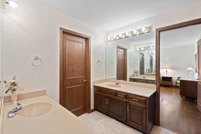 10 Shoreside Dr, South Barrington, IL 60010 - bathroom with two vanities and tile patterned floors
