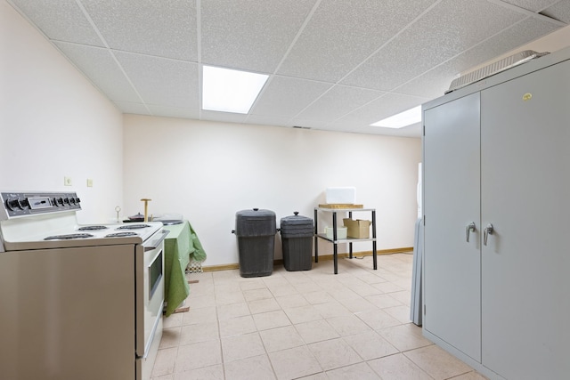 10 Shoreside Dr, South Barrington, IL 60010 - laundry area with light tile patterned floors and baseboards