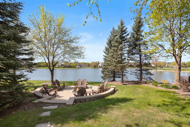 10 Shoreside Dr, South Barrington, IL 60010 - view of grassy yard featuring a water view, a fire pit, and a patio area