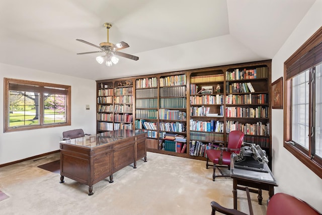 10 Shoreside Dr, South Barrington, IL 60010 - office featuring plenty of natural light, carpet flooring, bookshelves, and ceiling fan