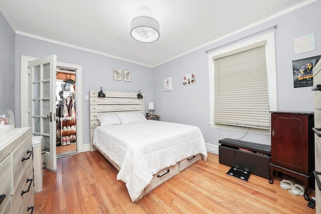 3115 N Marmora Ave, Chicago, IL 60634 - bedroom featuring wood finished floors and ornamental molding