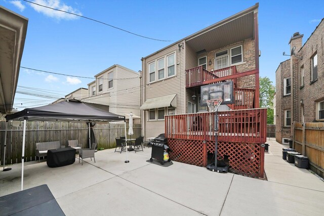 3115 N Marmora Ave, Chicago, IL 60634 - rear view of house with a gazebo, a patio, and a deck