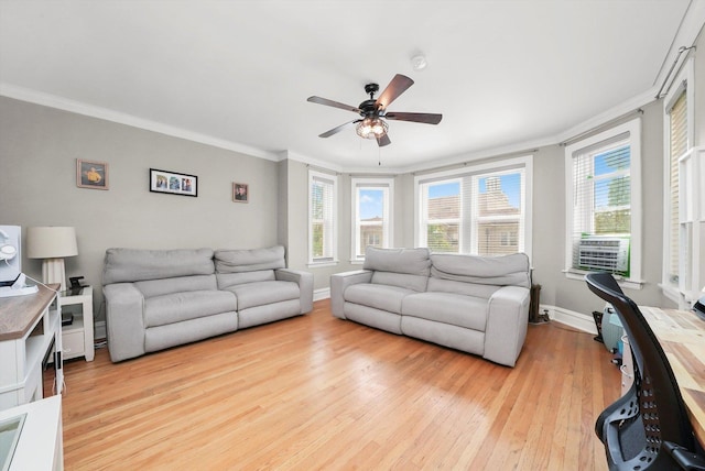 3115 N Marmora Ave, Chicago, IL 60634 - living room featuring ornamental molding, a ceiling fan, light wood finished floors, and cooling unit