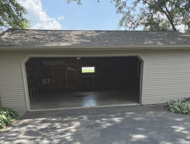 12238 Lisbon Rd, Newark, IL 60541 - garage with asphalt driveway