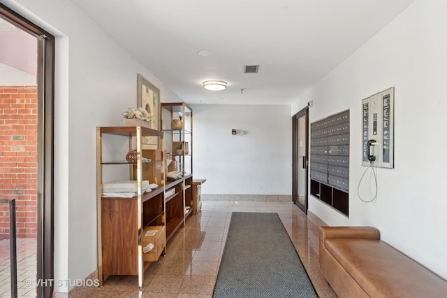 3700 Capri Ct Unit 607, Glenview, IL 60025 - corridor featuring mail area and granite tiled floors