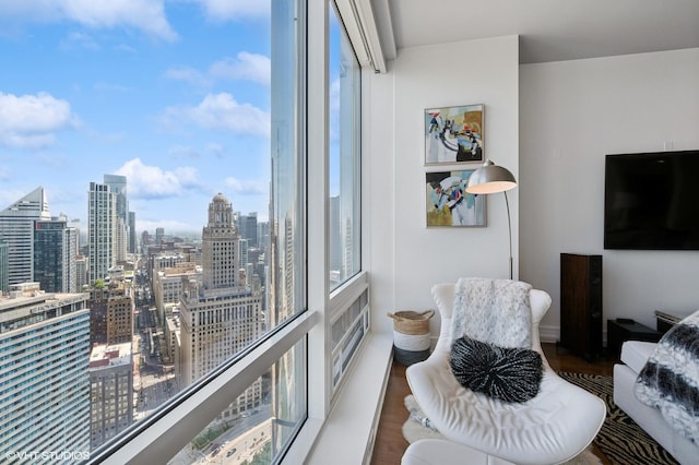 401 N Wabash Ave Unit 32J, Chicago, IL 60611 - dining room with wood finished floors and a wall of windows