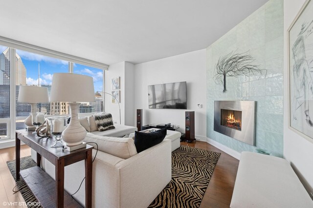 401 N Wabash Ave Unit 32J, Chicago, IL 60611 - dining area with a skyline view, wood finished floors, and a wall of windows