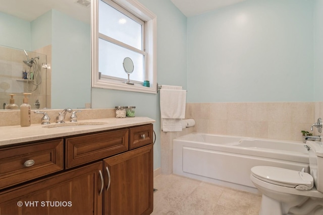 4933 N Winthrop Ave Unit 2S, Chicago, IL 60640 - full bathroom featuring a garden tub, vanity, tile patterned flooring, and tiled shower