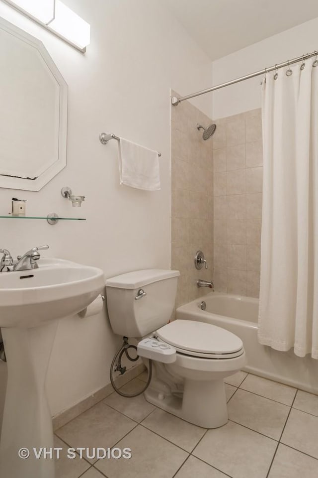 4933 N Winthrop Ave Unit 2S, Chicago, IL 60640 - full bathroom with shower / bathtub combination with curtain and tile patterned floors