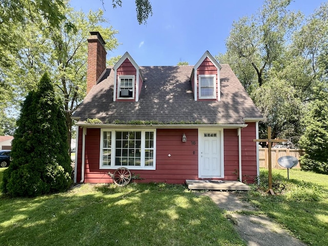 16 W George St, Sullivan, IL 61951 - cape cod home with a chimney and roof with shingles