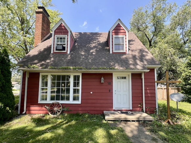 16 W George St, Sullivan, IL 61951 - cape cod house with a chimney and a shingled roof