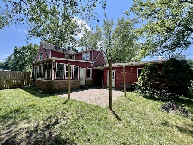 16 W George St, Sullivan, IL 61951 - back of house featuring a patio area and brick siding