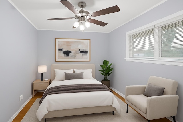 1205 N Irving Ave, Berkeley, IL 60163 - bedroom with wood finished floors, crown molding, and ceiling fan