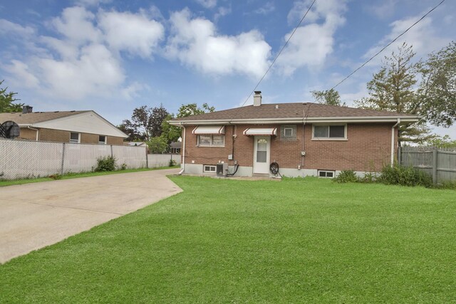 1205 N Irving Ave, Berkeley, IL 60163 - back of property featuring brick siding, concrete driveway, and a chimney