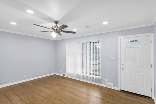 1205 N Irving Ave, Berkeley, IL 60163 - entryway with a ceiling fan, ornamental molding, wood finished floors, and recessed lighting