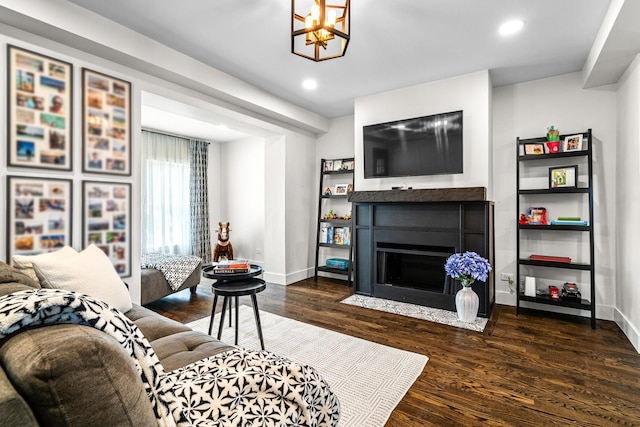 1212 Wesley Ave, Berwyn, IL 60402 - living room featuring dark wood finished floors, recessed lighting, and a fireplace with flush hearth
