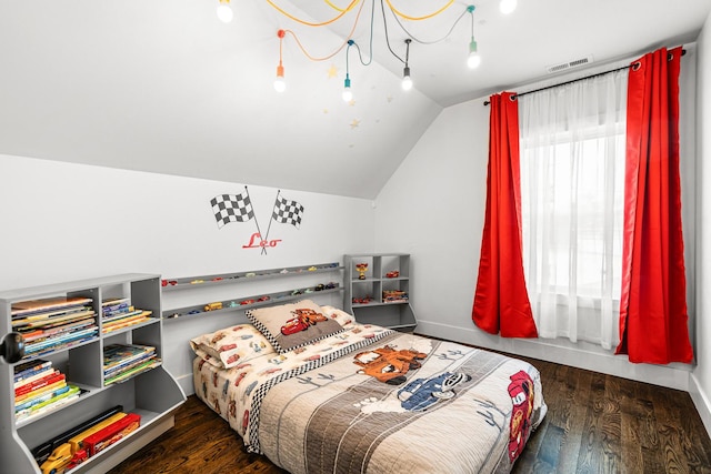 1212 Wesley Ave, Berwyn, IL 60402 - bedroom with lofted ceiling and hardwood / wood-style floors