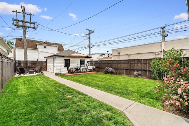 1212 Wesley Ave, Berwyn, IL 60402 - fenced backyard with a patio and an outbuilding