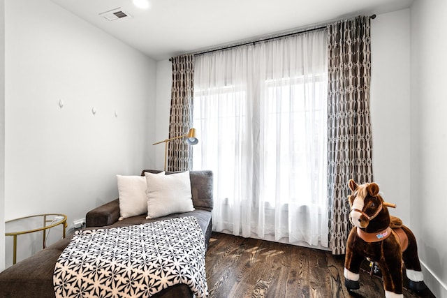 1212 Wesley Ave, Berwyn, IL 60402 - bedroom featuring dark wood finished floors and baseboards