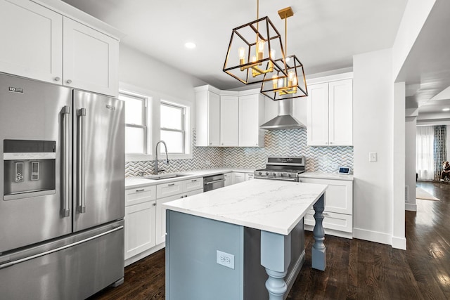 1212 Wesley Ave, Berwyn, IL 60402 - kitchen with stainless steel appliances, backsplash, wall chimney exhaust hood, a chandelier, and recessed lighting