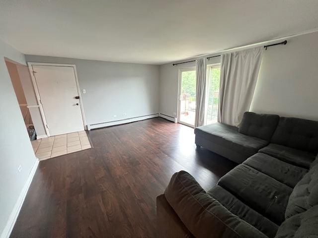 11111 S 84th Ave Unit 3A, Palos Hills, IL 60465 - living room featuring a baseboard radiator and wood finished floors