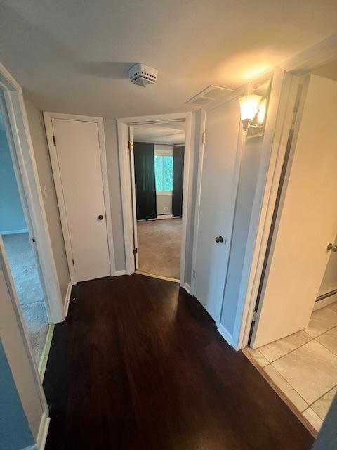 11111 S 84th Ave Unit 3A, Palos Hills, IL 60465 - hall with wood finished floors and baseboards