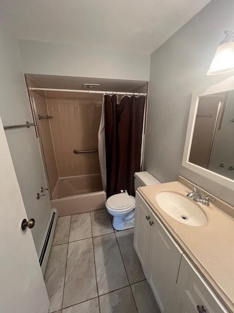 11111 S 84th Ave Unit 3A, Palos Hills, IL 60465 - bathroom featuring a baseboard heating unit, vanity, shower / bathtub combination with curtain, and tile patterned floors