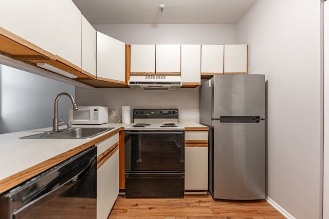 680 S Federal St Unit 409, Chicago, IL 60605 - kitchen with freestanding refrigerator, electric range oven, dishwasher, exhaust hood, and light countertops