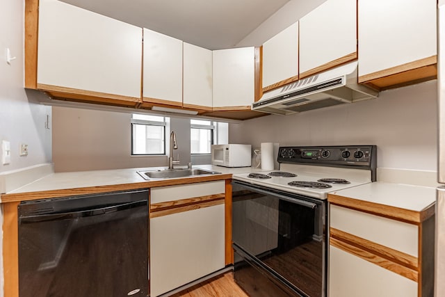 680 S Federal St Unit 409, Chicago, IL 60605 - kitchen featuring white appliances, under cabinet range hood, light countertops, and white cabinets