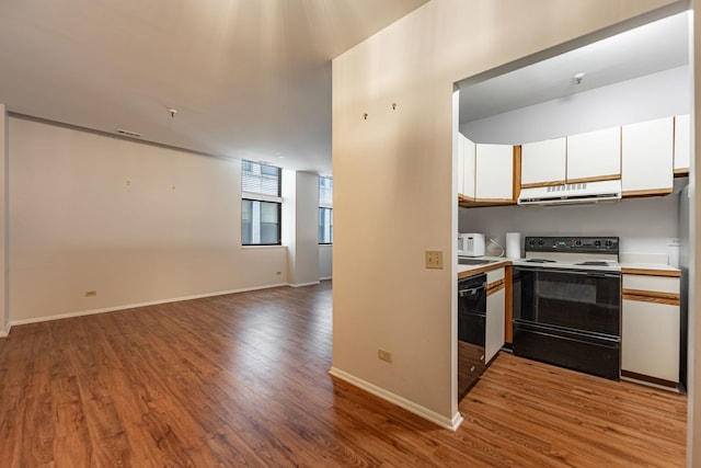 680 S Federal St Unit 409, Chicago, IL 60605 - kitchen featuring range with electric cooktop, extractor fan, dishwasher, light wood-style flooring, and white cabinetry