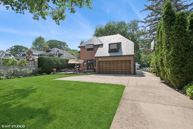 1415 Keystone Ave, River Forest, IL 60305 - view of front of home featuring brick siding, a garage, and driveway