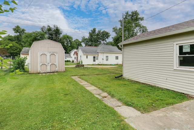 103 S Portland Pl, Clinton, IL 61727 - view of green lawn with a storage shed