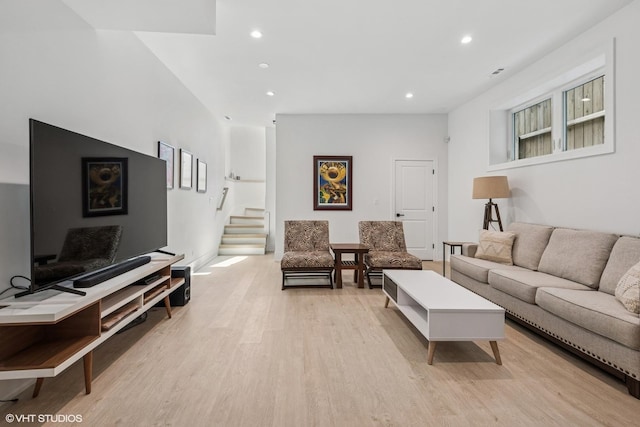 4535 S Evans Ave, Chicago, IL 60653 - living room featuring light wood-type flooring, recessed lighting, and stairs
