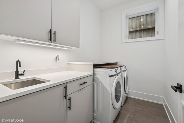4535 S Evans Ave, Chicago, IL 60653 - laundry area with cabinet space and washer and dryer