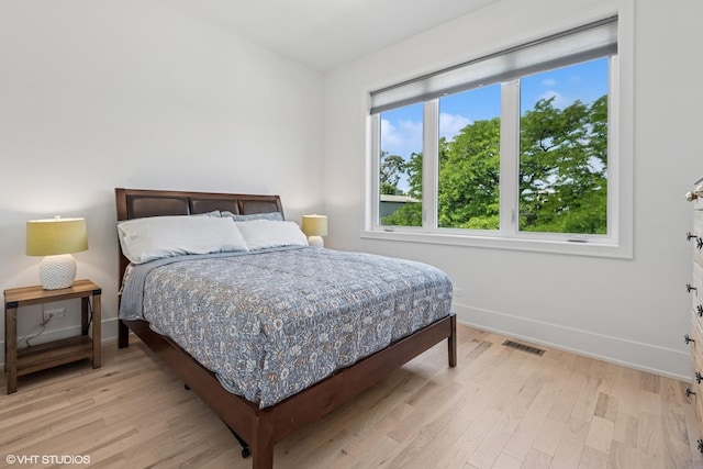 4535 S Evans Ave, Chicago, IL 60653 - bedroom with light wood-style flooring