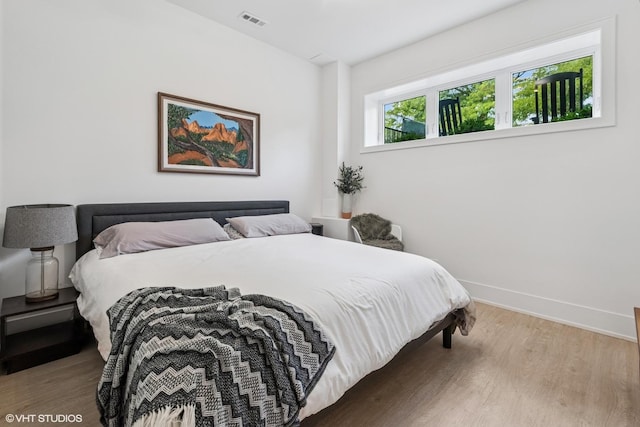 4535 S Evans Ave, Chicago, IL 60653 - bedroom featuring wood finished floors and baseboards