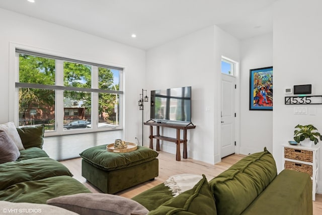 4535 S Evans Ave, Chicago, IL 60653 - living room with plenty of natural light, light wood-style floors, and recessed lighting