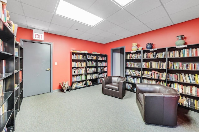 910 S Michigan Ave Unit 1005, Chicago, IL 60605 - living area featuring bookshelves, carpet flooring, and a drop ceiling