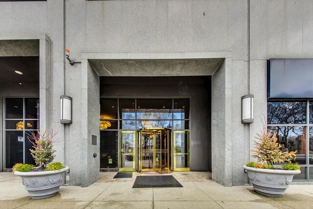 910 S Michigan Ave Unit 1005, Chicago, IL 60605 - doorway to property featuring stucco siding
