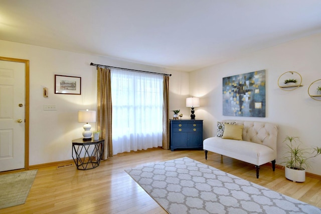 2146 Prairie Trl, Round Lake Heights, IL 60073 - sitting room featuring wood finished floors and baseboards