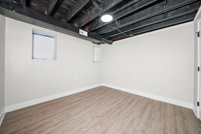 7719 S Morgan St, Chicago, IL 60620 - finished below grade area featuring wood finished floors and baseboards