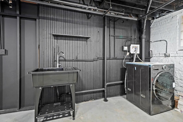 7719 S Morgan St, Chicago, IL 60620 - basement with washer / clothes dryer and a sink
