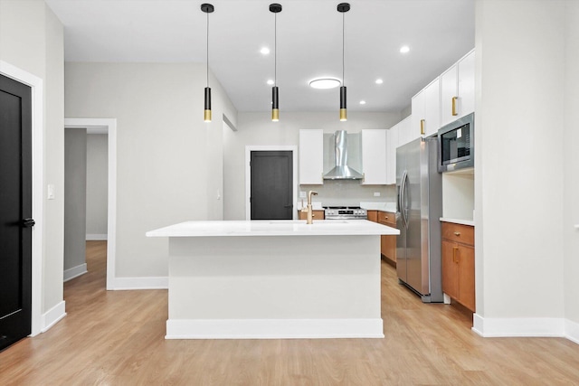 7719 S Morgan St, Chicago, IL 60620 - kitchen with wall chimney range hood, appliances with stainless steel finishes, light wood finished floors, light countertops, and recessed lighting