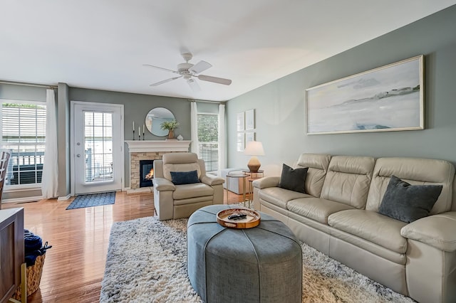 3211 Foxridge Ct, Woodridge, IL 60517 - living room featuring wood finished floors, ceiling fan, and a fireplace
