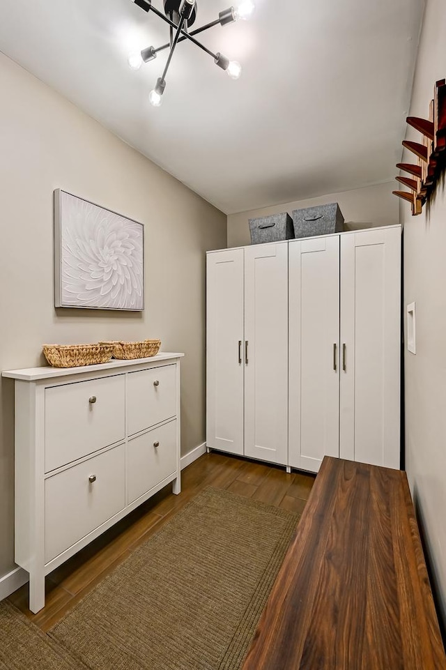 3211 Foxridge Ct, Woodridge, IL 60517 - unfurnished bedroom featuring dark wood finished floors and a chandelier