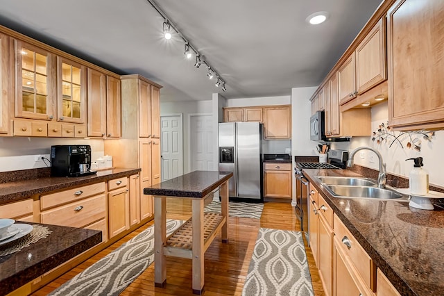 3211 Foxridge Ct, Woodridge, IL 60517 - kitchen with appliances with stainless steel finishes, light wood-type flooring, glass insert cabinets, and light brown cabinetry