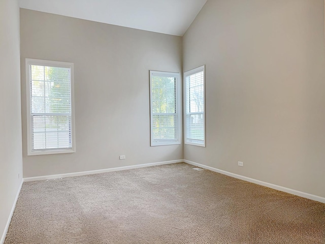 1214 Eric Ln, Lake Zurich, IL 60047 - spare room featuring vaulted ceiling and carpet flooring