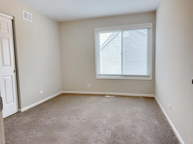1214 Eric Ln, Lake Zurich, IL 60047 - carpeted empty room featuring baseboards