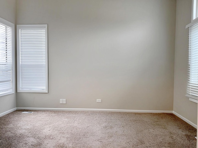 1214 Eric Ln, Lake Zurich, IL 60047 - carpeted empty room with baseboards